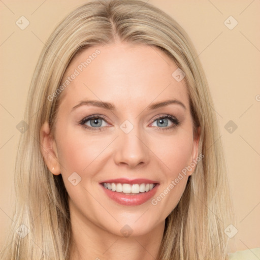 Joyful white young-adult female with long  brown hair and blue eyes