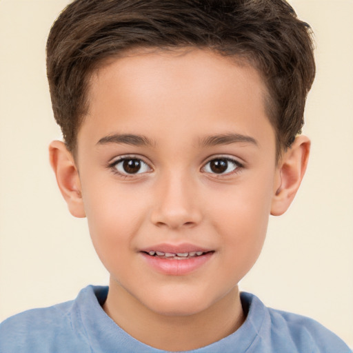 Joyful white child male with short  brown hair and brown eyes