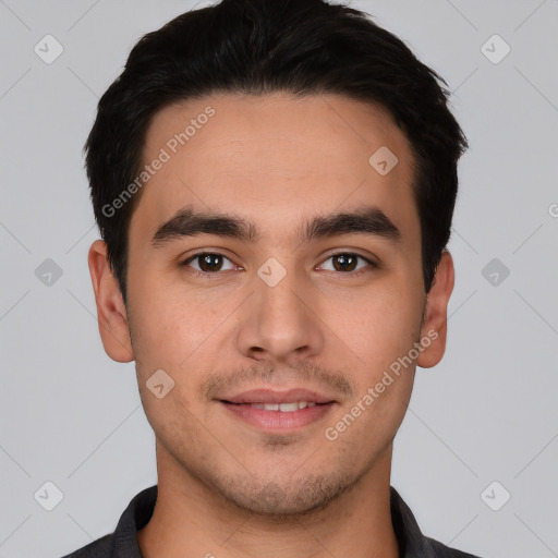 Joyful white young-adult male with short  black hair and brown eyes