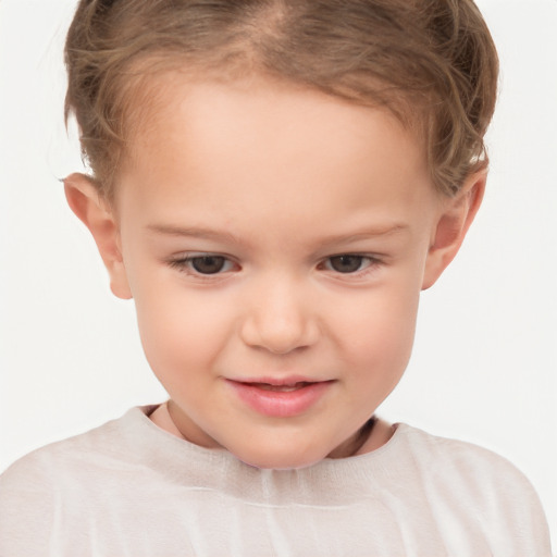 Joyful white child female with short  brown hair and brown eyes