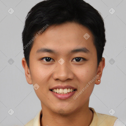 Joyful asian young-adult male with short  black hair and brown eyes