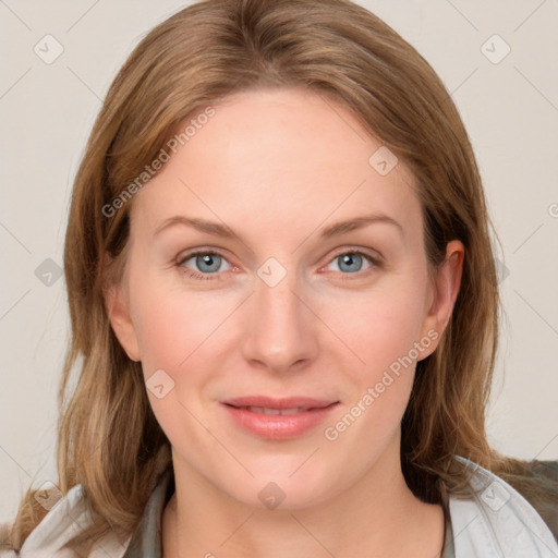 Joyful white young-adult female with medium  brown hair and blue eyes