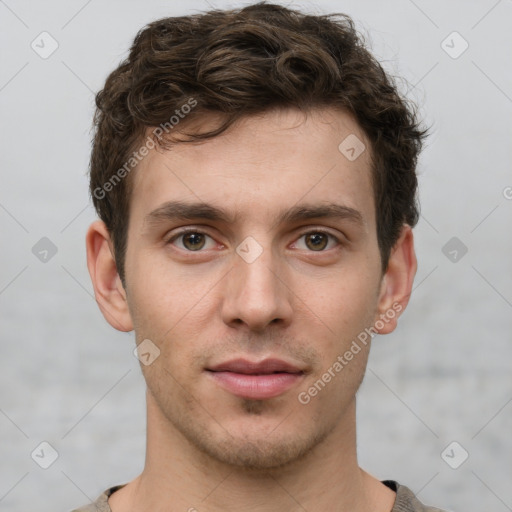 Neutral white young-adult male with short  brown hair and grey eyes