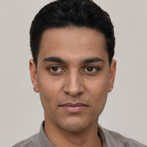 Neutral latino young-adult male with short  black hair and brown eyes