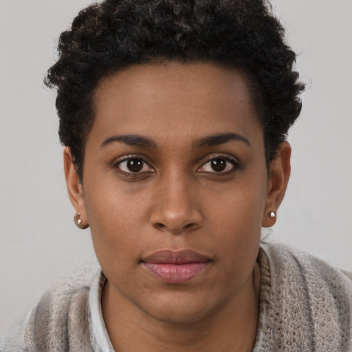 Neutral black young-adult female with short  brown hair and brown eyes