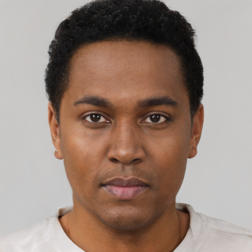Neutral black young-adult male with short  black hair and brown eyes
