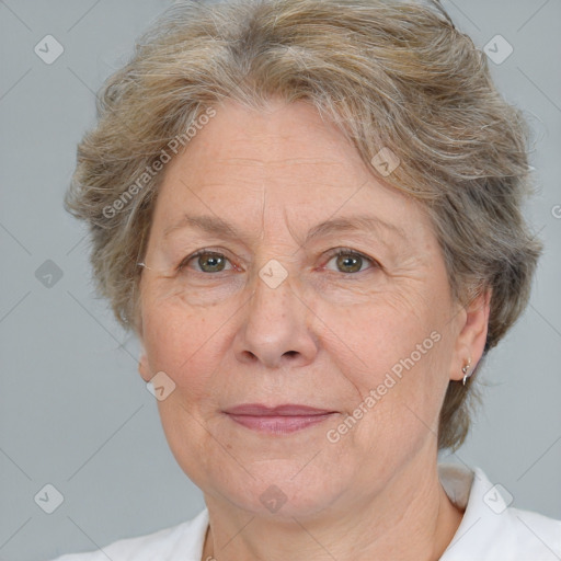 Joyful white middle-aged female with short  brown hair and brown eyes