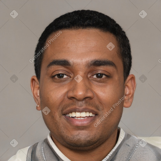 Joyful black young-adult male with short  black hair and brown eyes