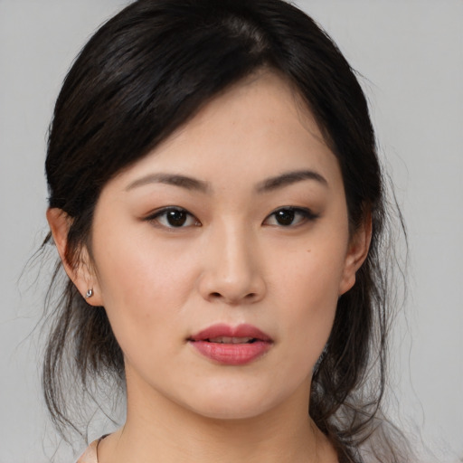 Neutral asian young-adult female with medium  black hair and brown eyes