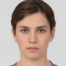 Neutral white young-adult female with short  brown hair and brown eyes