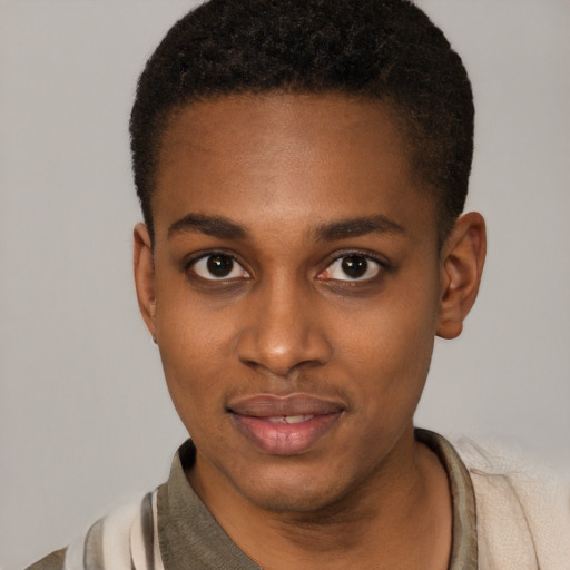 Joyful black young-adult female with short  brown hair and brown eyes