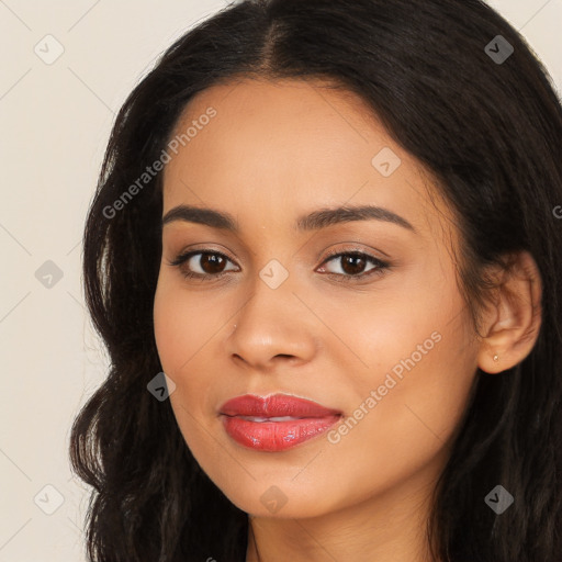 Joyful latino young-adult female with long  brown hair and brown eyes