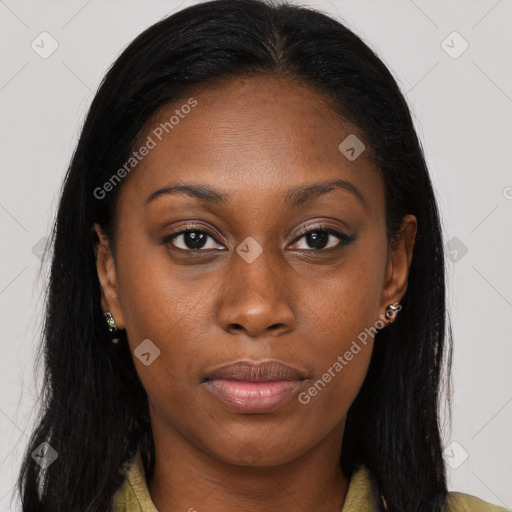 Joyful black young-adult female with long  brown hair and brown eyes