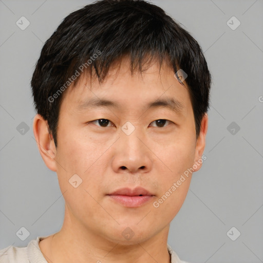 Neutral asian young-adult male with short  brown hair and brown eyes