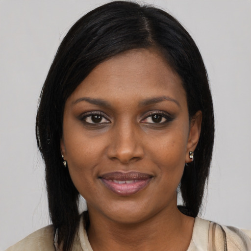 Joyful asian young-adult female with medium  black hair and brown eyes