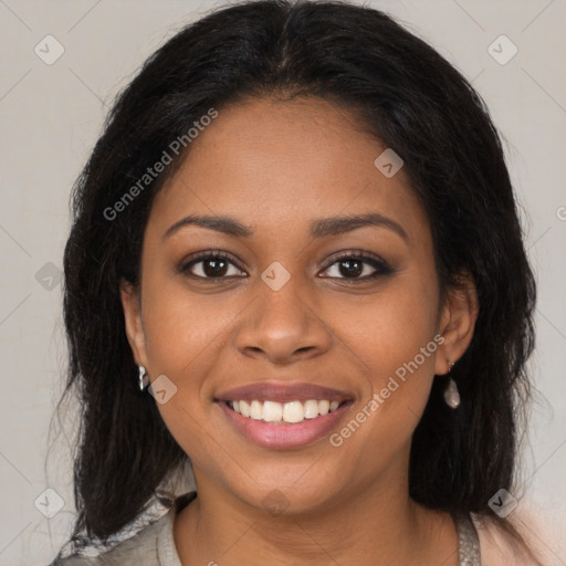 Joyful black young-adult female with medium  brown hair and brown eyes