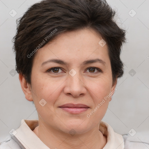 Joyful white adult female with short  brown hair and brown eyes