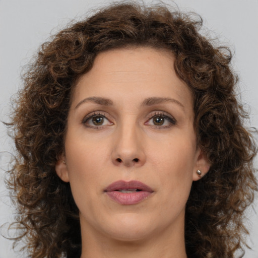 Neutral white adult female with medium  brown hair and brown eyes