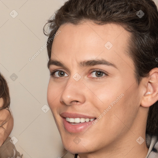 Joyful white young-adult male with medium  brown hair and brown eyes