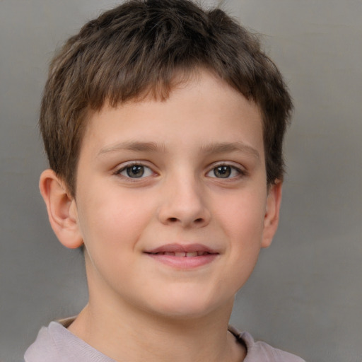 Joyful white child male with short  brown hair and brown eyes