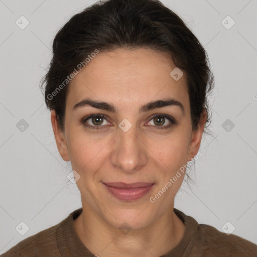 Joyful white adult female with short  brown hair and brown eyes