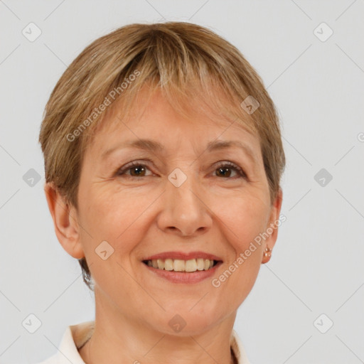 Joyful white adult female with short  brown hair and brown eyes