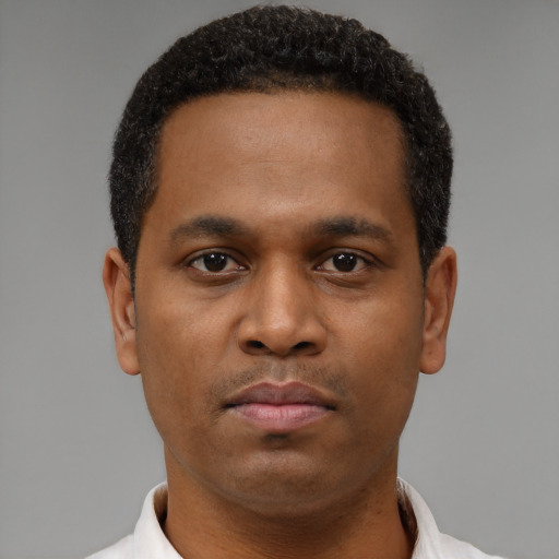 Neutral black young-adult male with short  brown hair and brown eyes