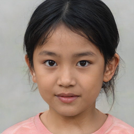 Joyful asian child female with medium  brown hair and brown eyes