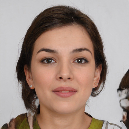 Neutral white young-adult female with medium  brown hair and brown eyes