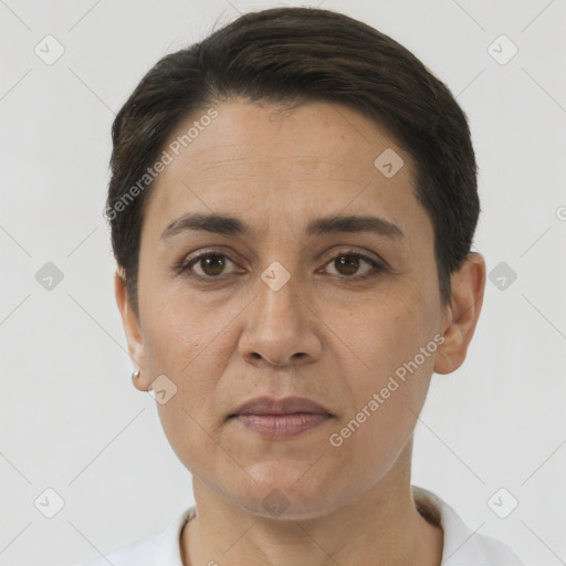 Joyful white adult female with short  brown hair and brown eyes