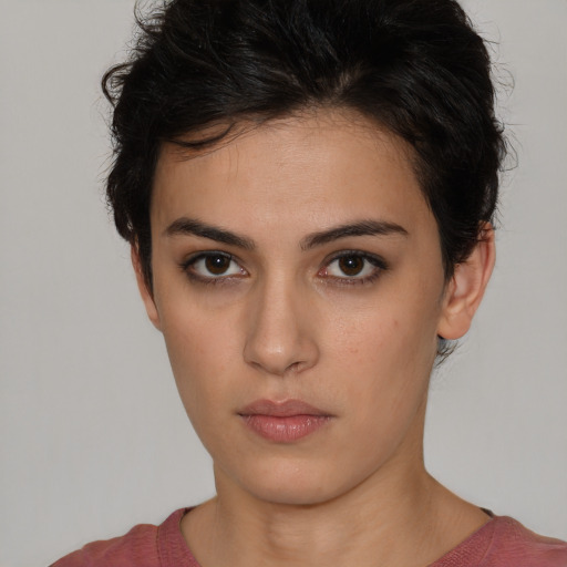 Neutral white young-adult female with short  brown hair and brown eyes