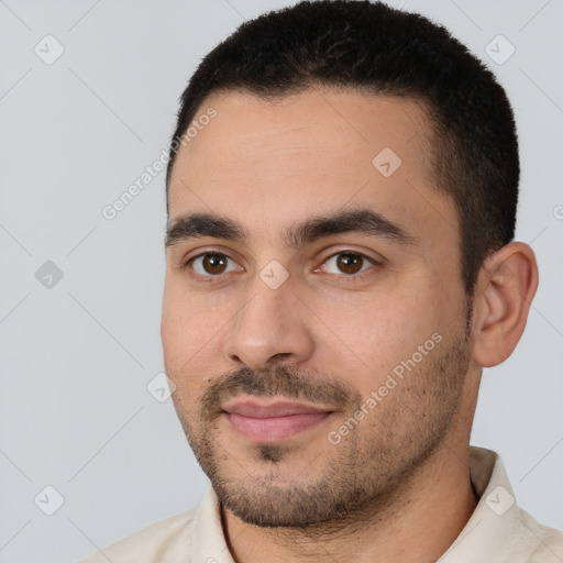 Joyful white young-adult male with short  black hair and brown eyes