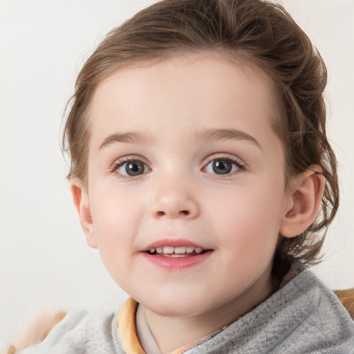 Joyful white child female with medium  brown hair and grey eyes