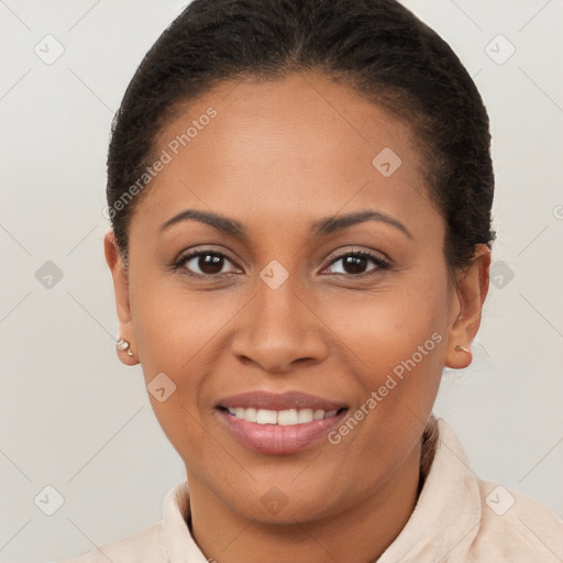 Joyful latino young-adult female with short  brown hair and brown eyes