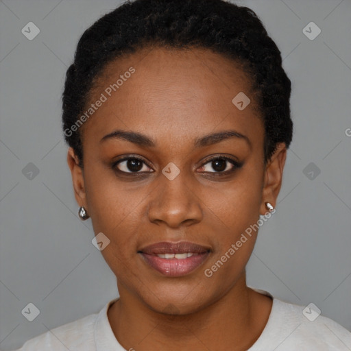 Joyful black young-adult female with short  black hair and brown eyes