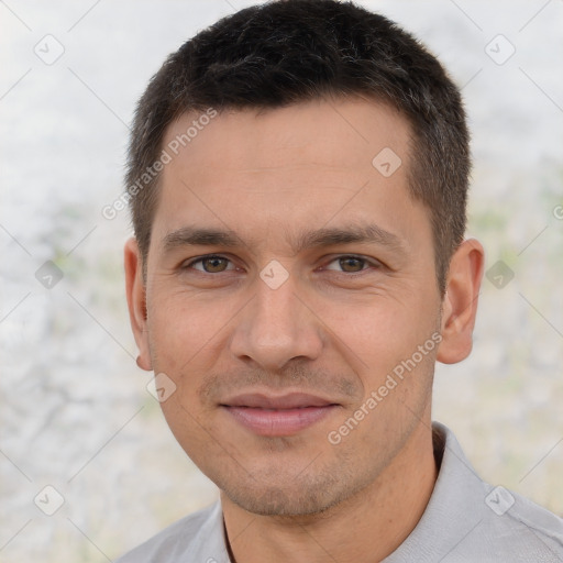 Joyful white young-adult male with short  brown hair and brown eyes