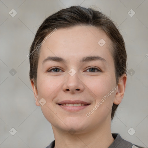 Joyful white young-adult female with short  brown hair and brown eyes