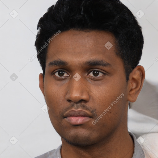 Neutral black young-adult male with short  black hair and brown eyes