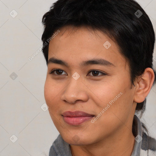 Joyful asian young-adult female with short  black hair and brown eyes