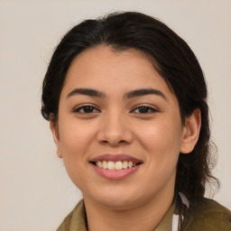 Joyful asian young-adult female with medium  brown hair and brown eyes