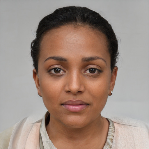 Neutral latino young-adult female with short  brown hair and brown eyes