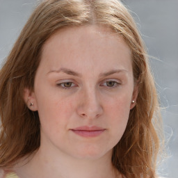 Joyful white young-adult female with long  brown hair and blue eyes