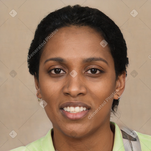 Joyful black young-adult female with short  black hair and brown eyes