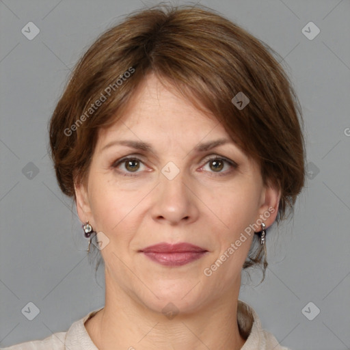 Joyful white adult female with medium  brown hair and grey eyes