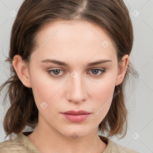 Neutral white young-adult female with medium  brown hair and brown eyes