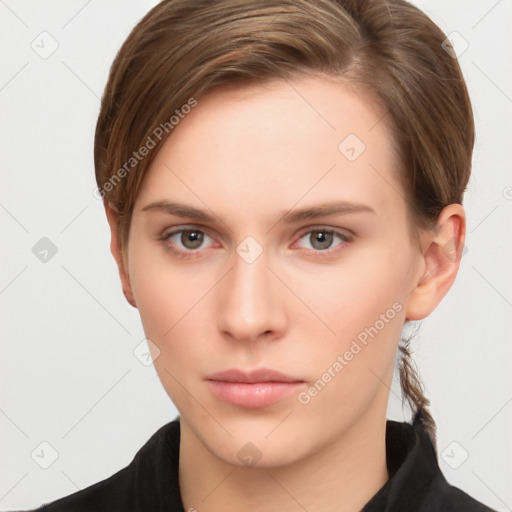 Neutral white young-adult female with short  brown hair and brown eyes