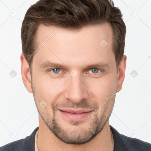 Joyful white young-adult male with short  brown hair and grey eyes