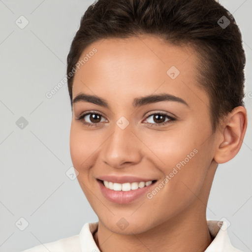 Joyful white young-adult female with short  brown hair and brown eyes