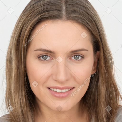 Joyful white young-adult female with long  brown hair and grey eyes