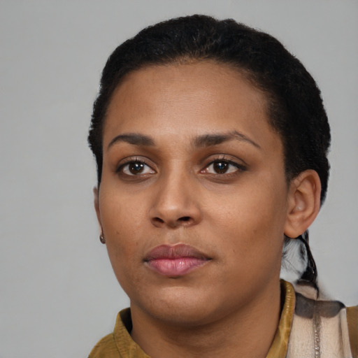 Neutral black young-adult female with short  black hair and brown eyes